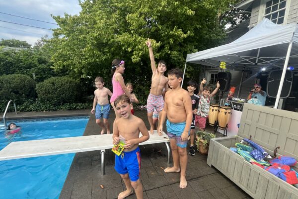 Jackson party with kids at pool and DJ Booth